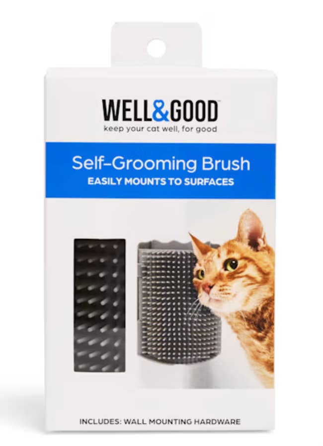 Self-grooming brush for cats with wall mount included, shown in packaging with a cat demonstrating use