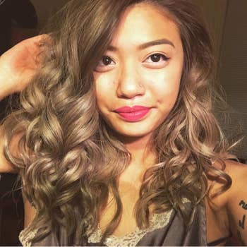 A reviewer with voluminous hair