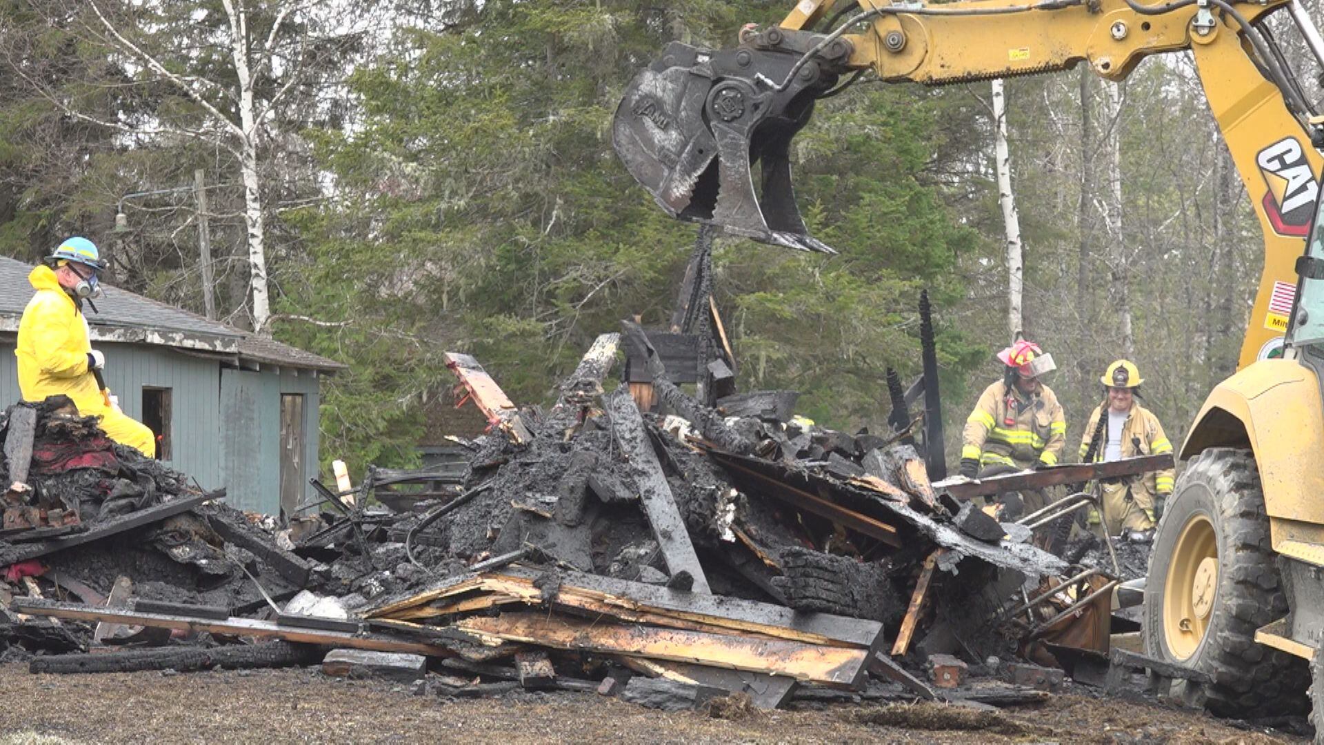 Woman dies in Mapleton house fire