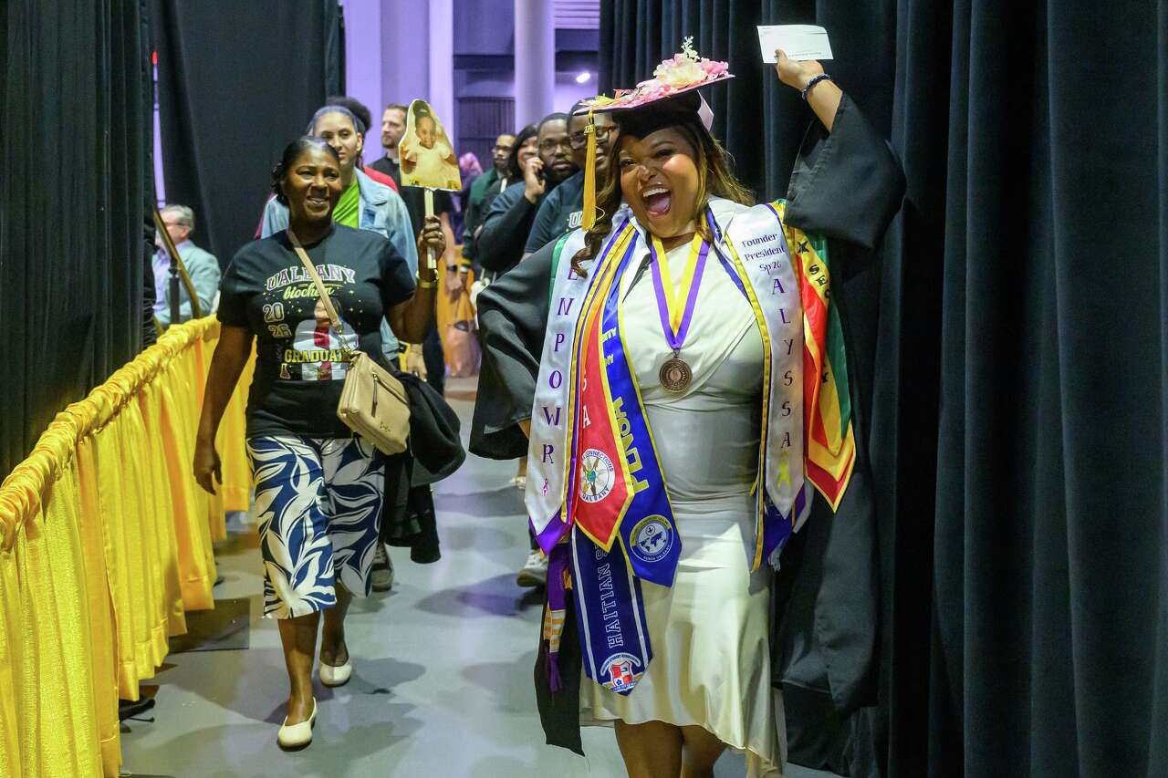 Photos: Graduates walk at University at Albany