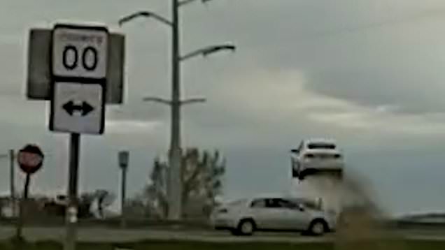 Police awestruck when suspect they're chasing jumps his car over ...