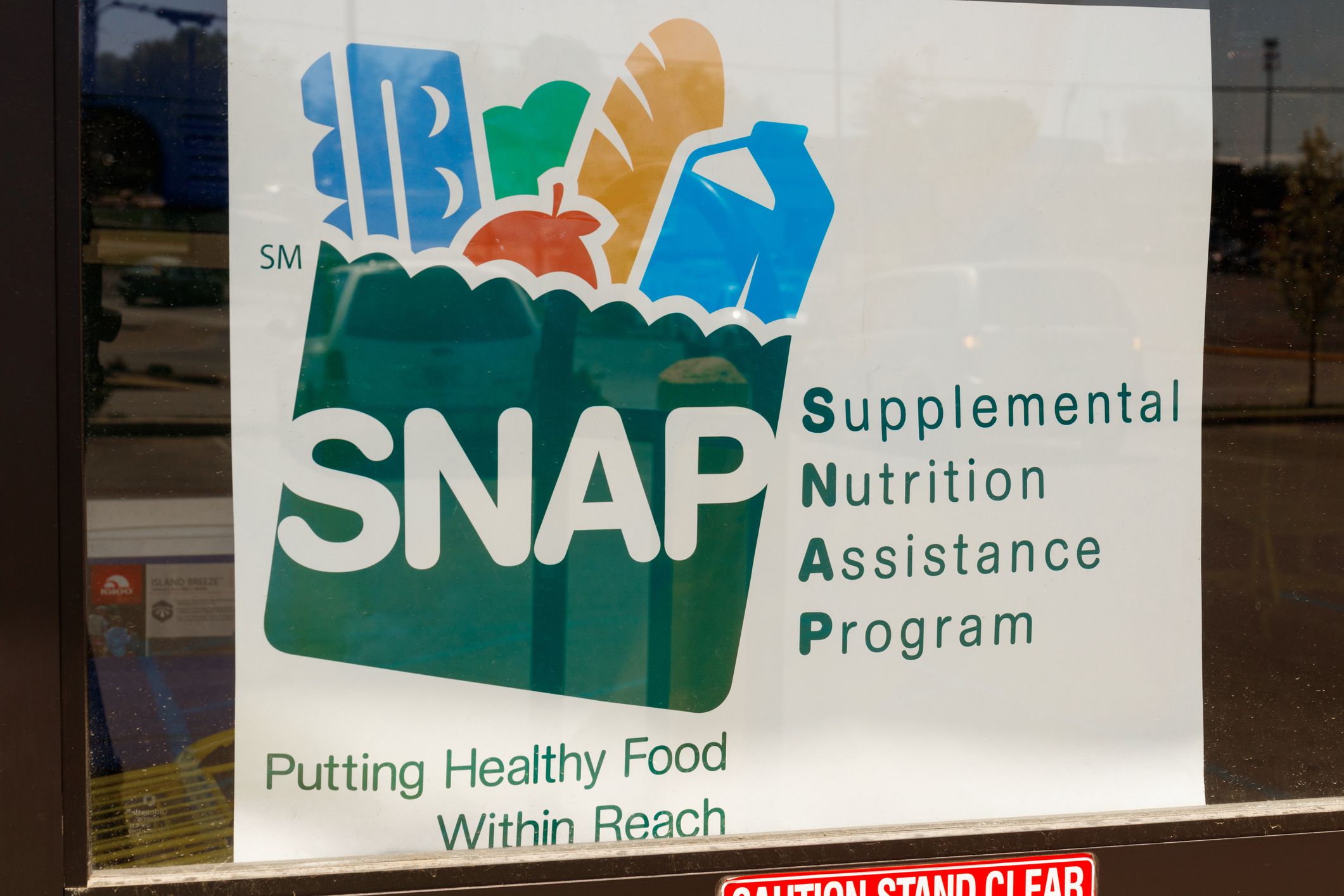 A Sign at a Retailer – We Accept SNAP IV