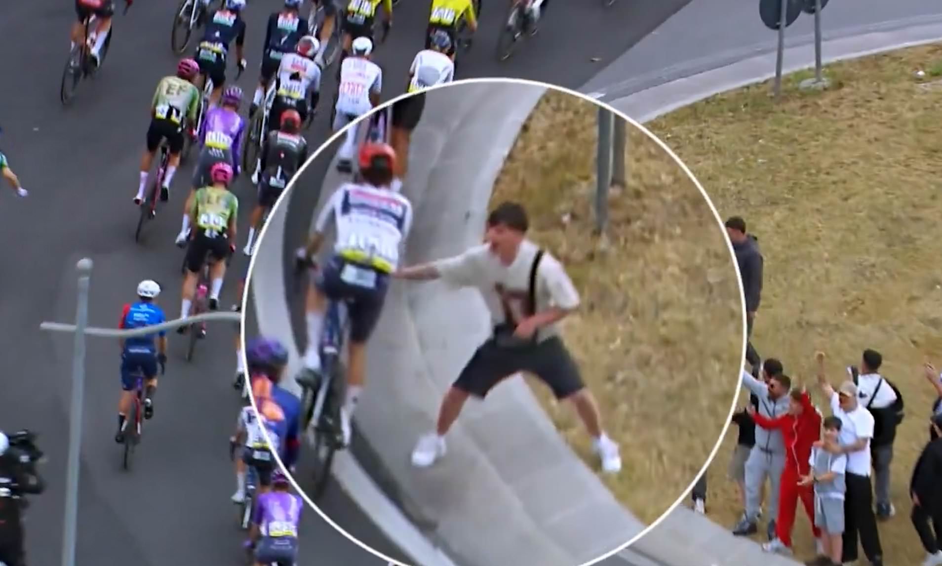 Two charged after dangerous Giro d'Italia spectator stunt