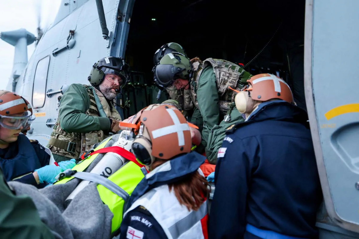 Badly-injured sailor treated by medics from HMS Prince of Wales during ...