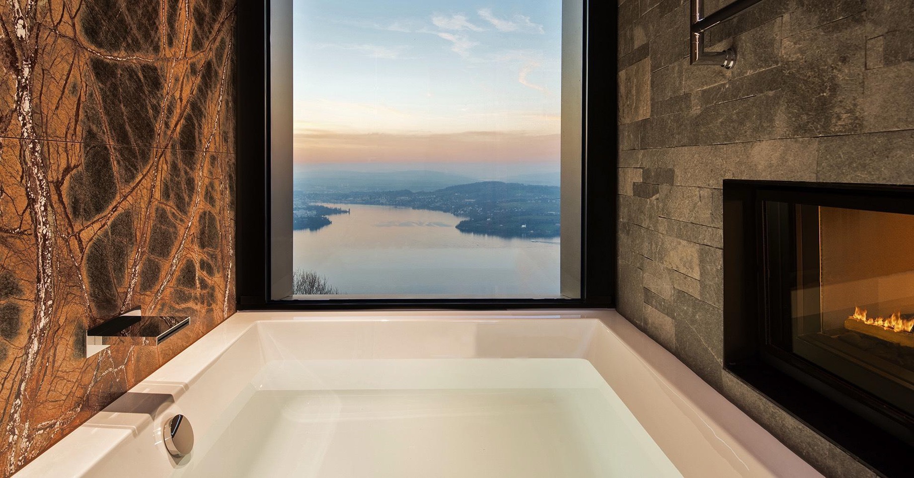 View of The best Swiss hotels with private pools and tubs overlooking the Alps