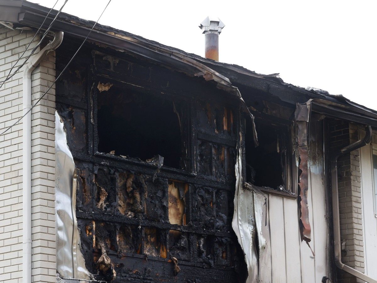 One dead in Russell Road townhouse fire, arson unit investigating