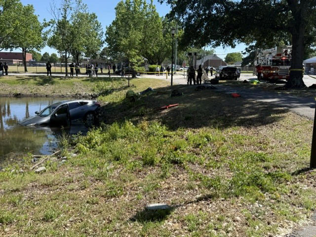Norfolk crash ends with car in water, other driver in custody