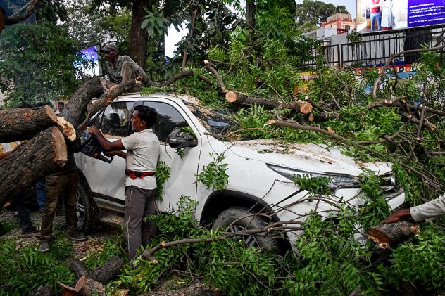 Deadly storms, flooding rain kill at least 96 in India