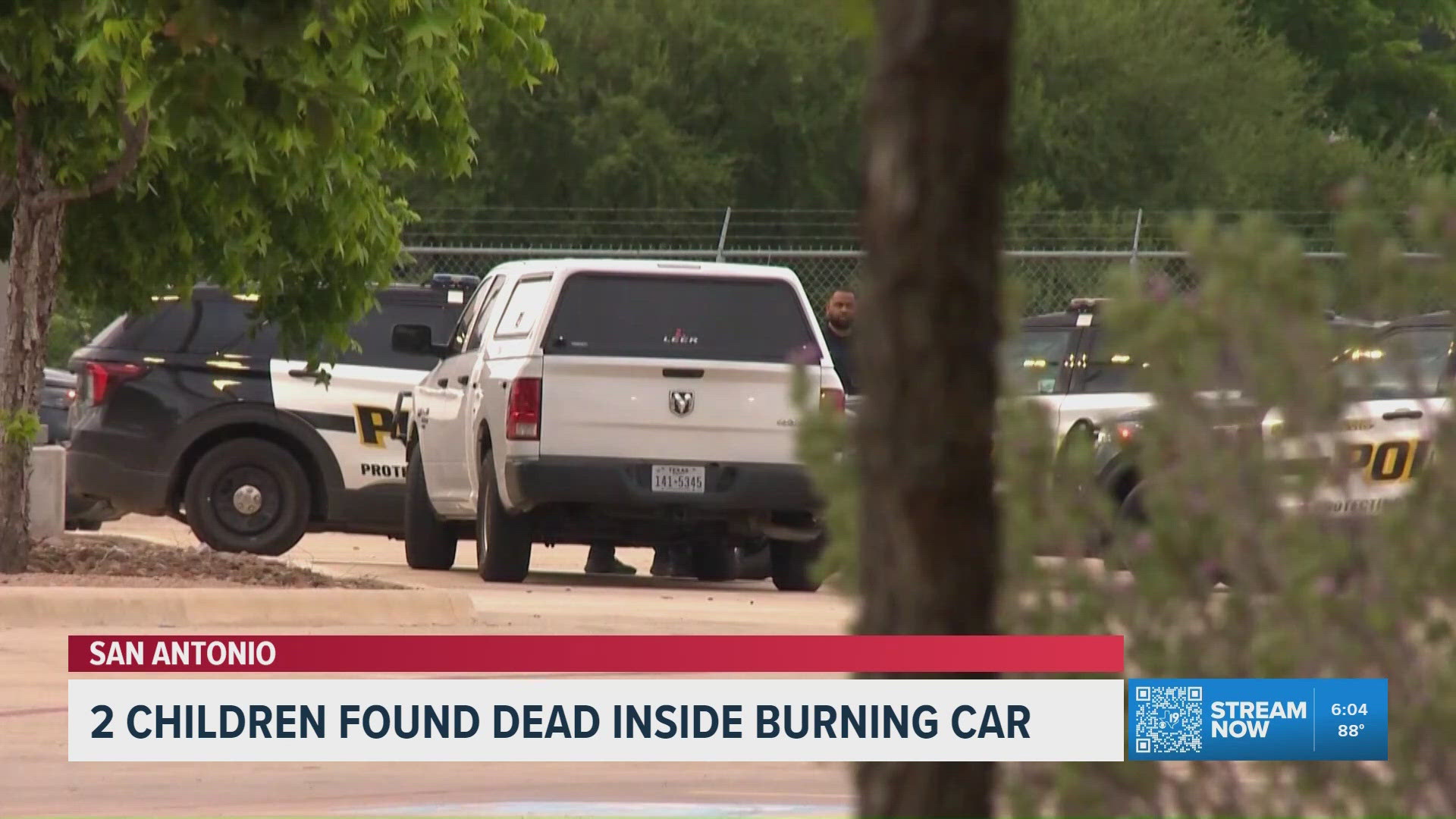 Woman charged after two children found dead in burning car