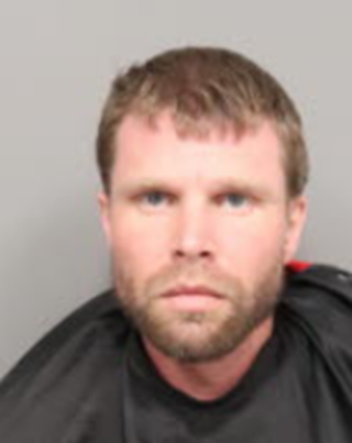Police: Suspect in custody after bank robbery prompts lockdown for ...
