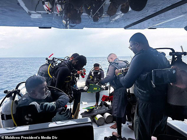 The body of scuba diving instructor Gianluca Benedetti was recovered from a cave on Thursday, but rescuers were still searching for the remaining four divers today