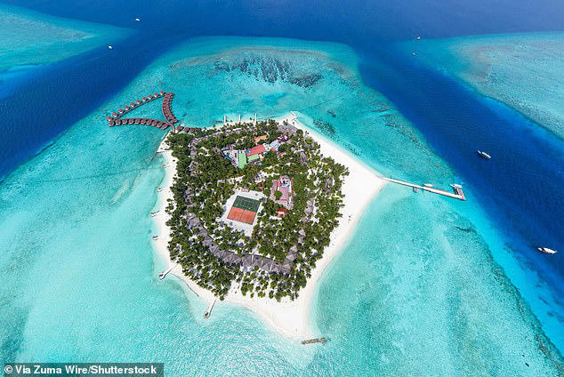 The Maldives, a nation of 1,192 tiny coral islands scattered some 500 miles across the equator in the Indian Ocean, is a luxury holiday destination popular with divers. The divers went missing close to Alimathaa (pictured)