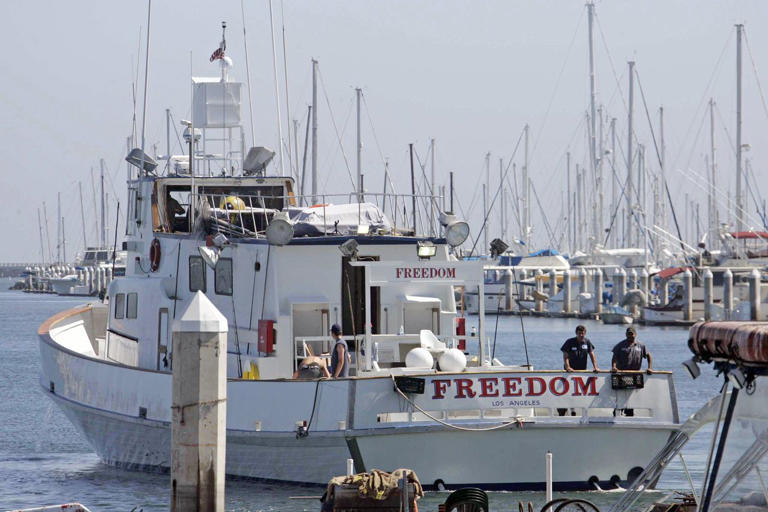 Patrick McDermott's boat in 2005 Credit: AP Photo/Nick Ut