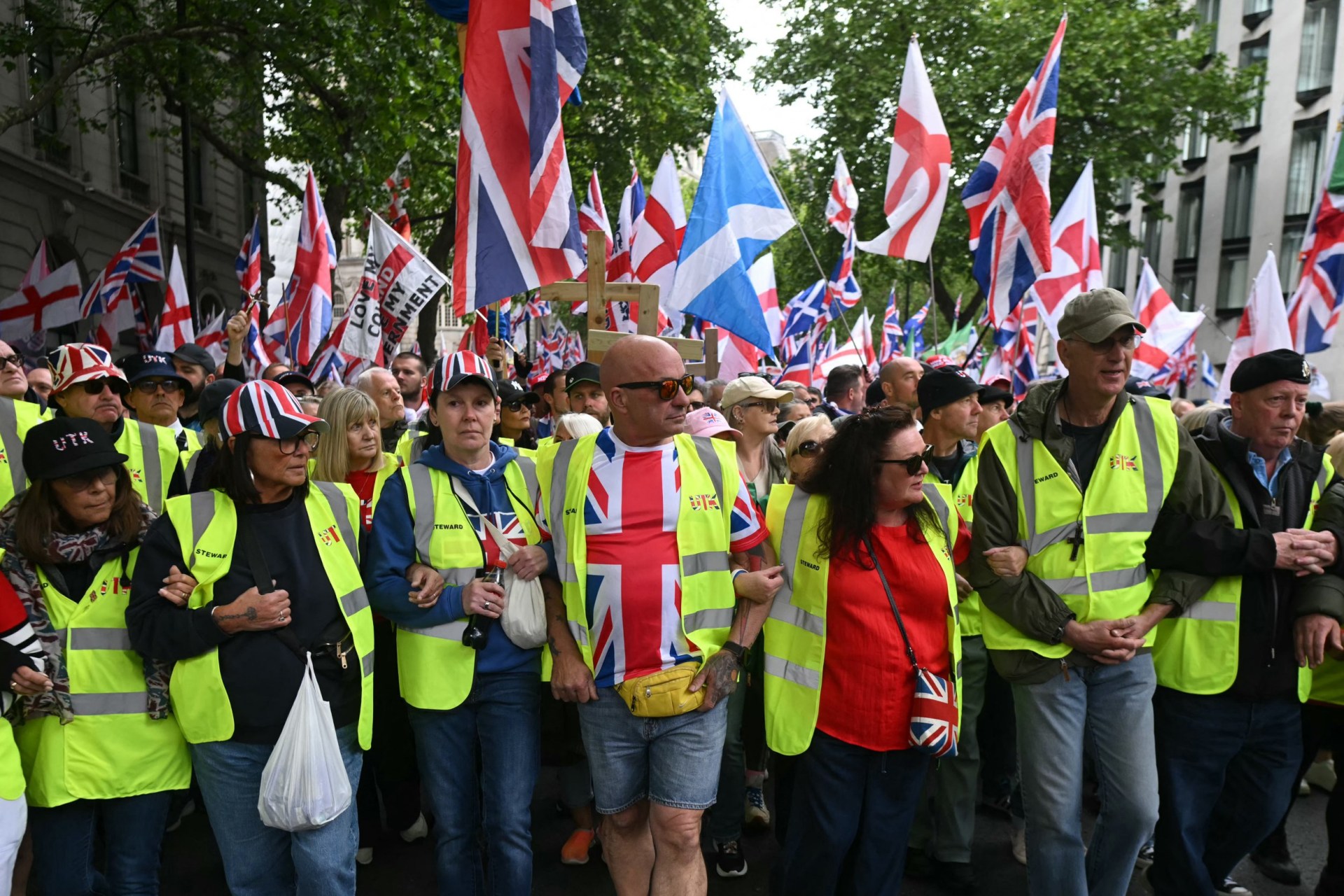 'We're all immigrants' screen planted in right-wing Tommy Robinson rally