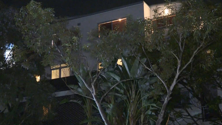A man in his forties has died after plunging more than a dozen metres from the balcony of a unit block in Sydney.