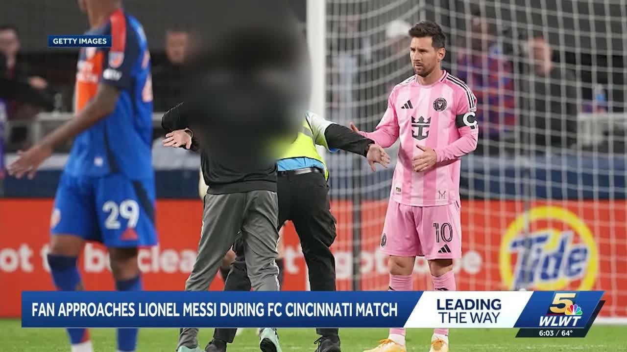 Fan rushes Lionel Messi during FC Cincinnati match, stopped by security