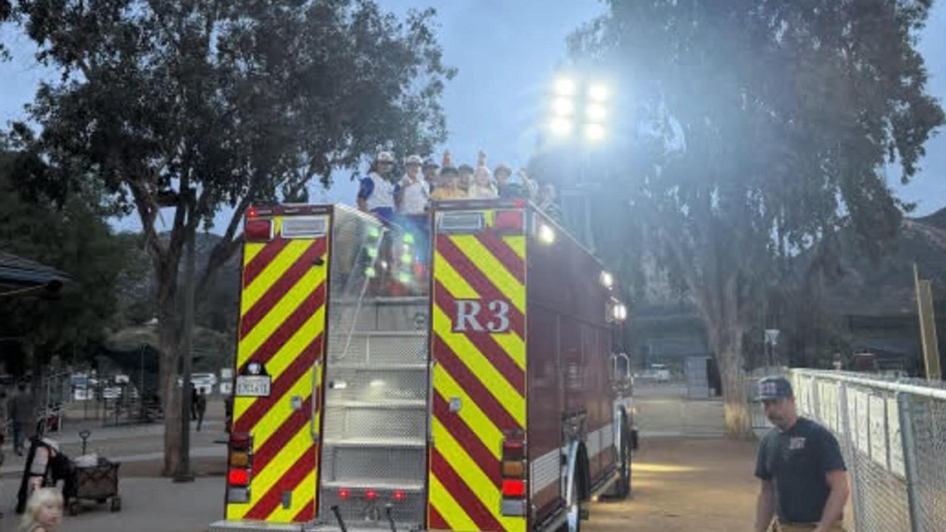 California fire crews save Little League game from power outage
