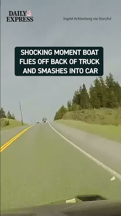 Shocking moment boat flies off truck and smashes into car