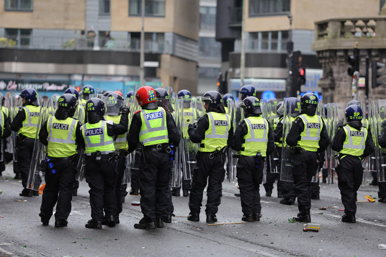Two police officers hurt and 14 arrests due to disorder in Glasgow ...