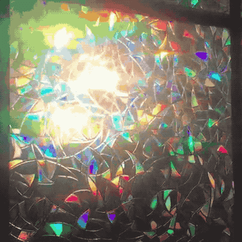 reviewer gif of the film installed creating rainbow effect with the light coming through