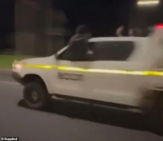 Two of the teenagers can be seen hanging outside the ute before it crashed