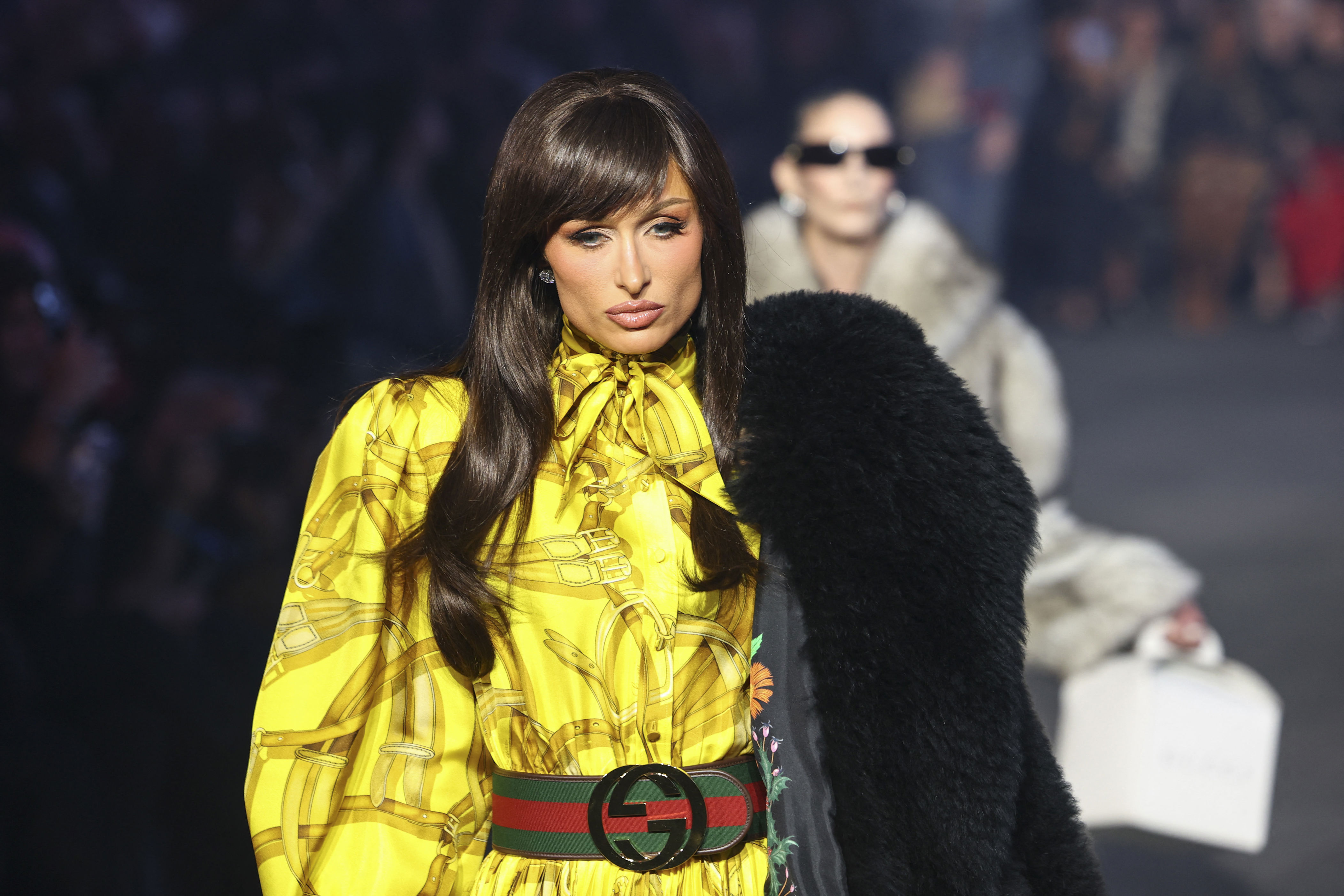 Paris Hilton transforms into a brunette for Gucci runway show