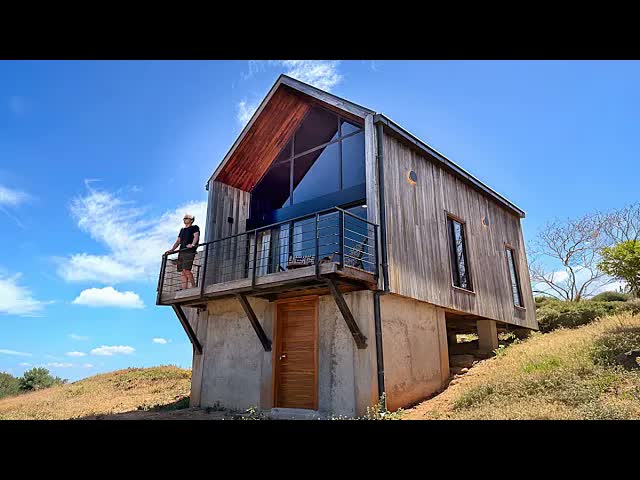 Inside the 500 sq ft cottage style prefab home with a full height loft!