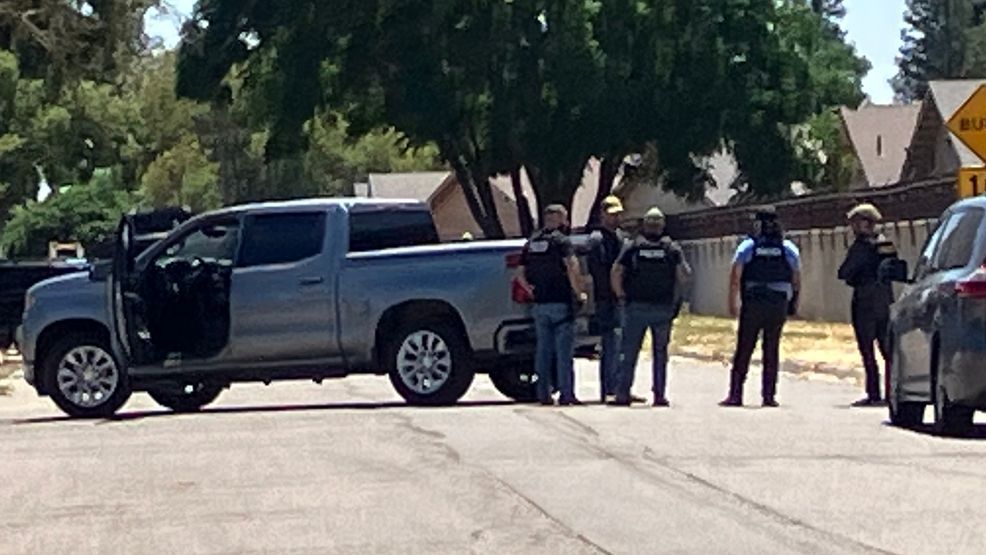 Man sought in officer shooting found with self-inflicted wound in ...