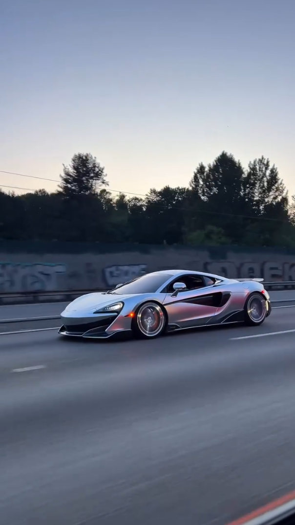 McLaren 600LT highway surfing in silver surfer style