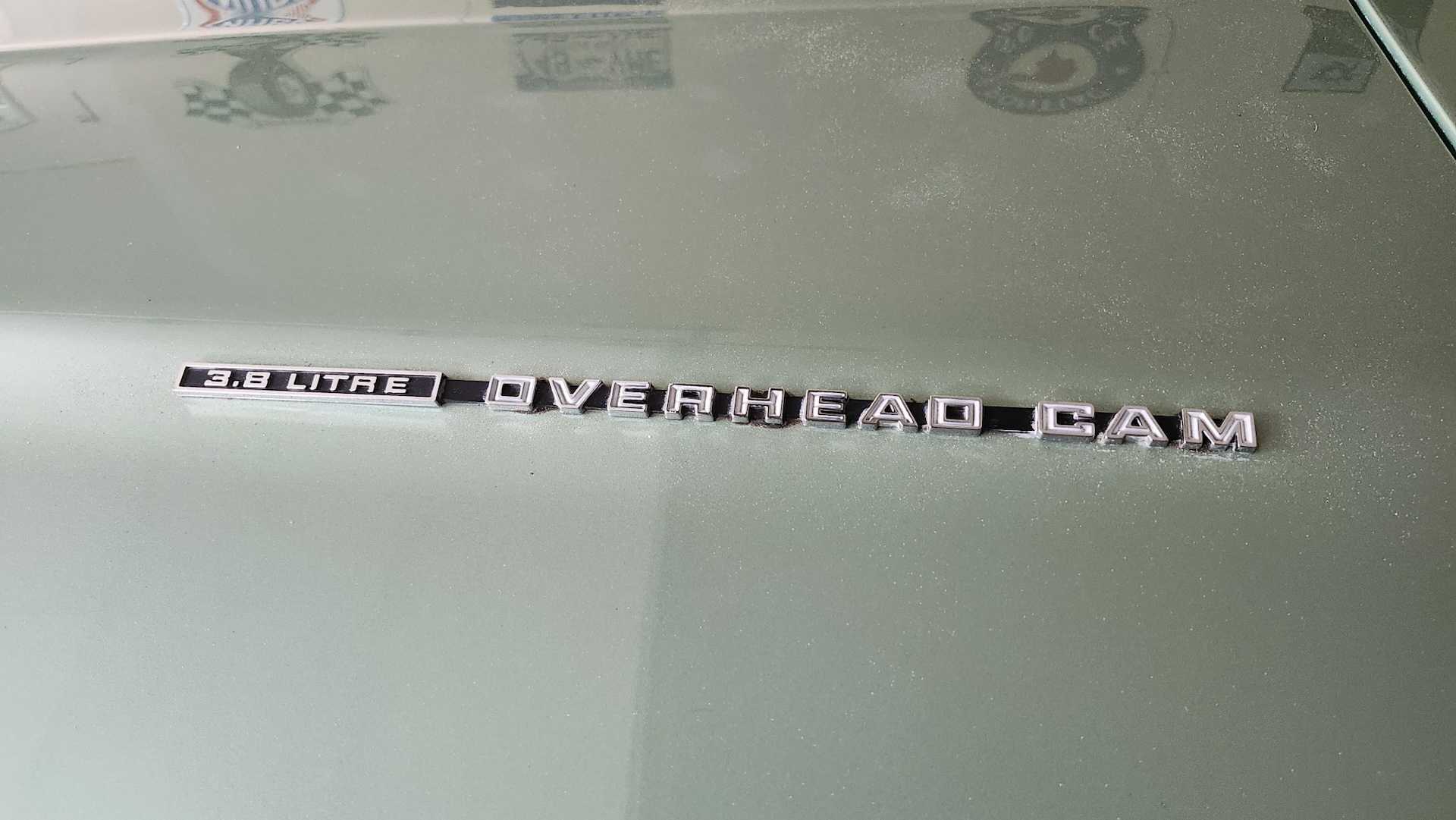 The "OHC Sprint" badge on the hood of a classic Pontiac muscle car