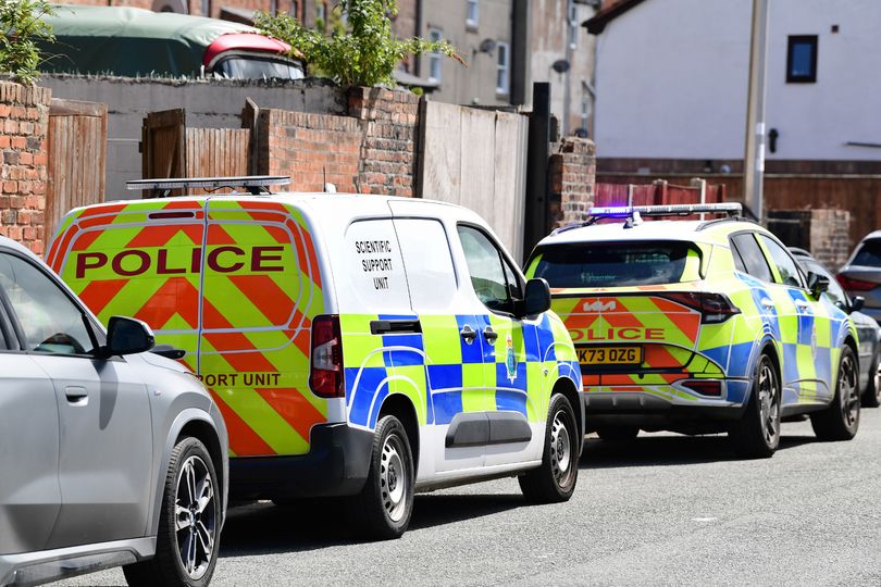 Woman found dead as police fill quiet Toxteth street