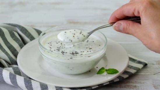 Thick Greek yoghurt raita with omega rich seeds for refreshing everyday ...