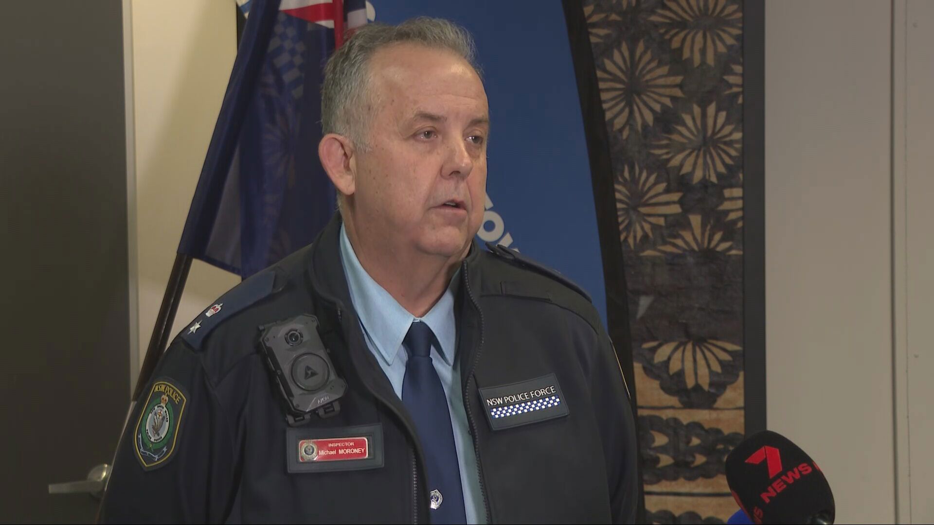 Acting Superintendent Michael Moroney addresses the media after a woman and two children were found dead at a home in Bankstown.