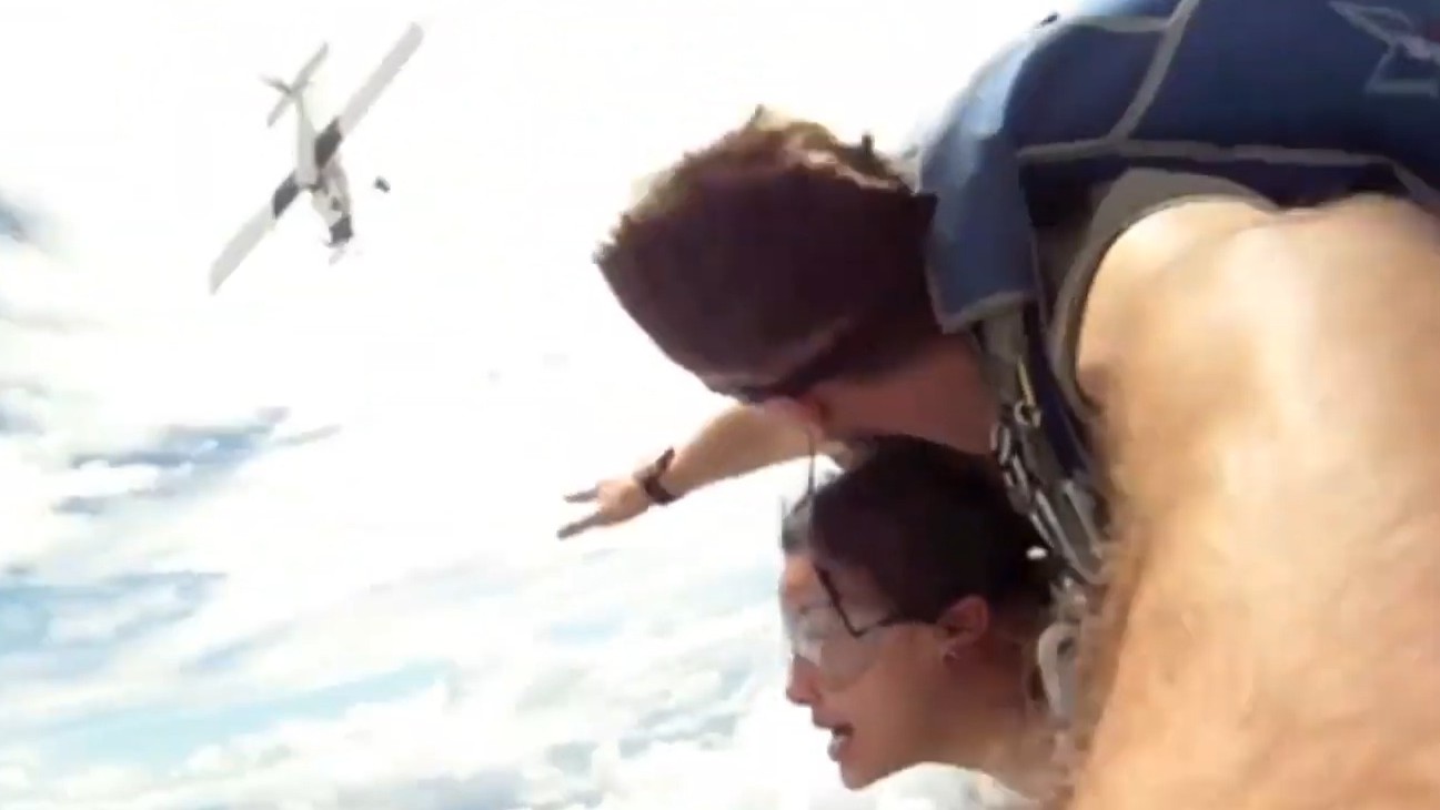 The plane missed them by inches - but still destroyed their main parachute