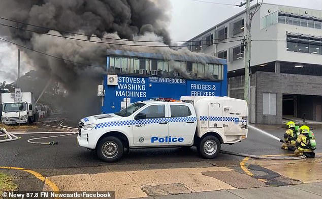 The fire has been contained to one building and has not spread to residential buildings nearby but the operation was still underway about 7.30pm