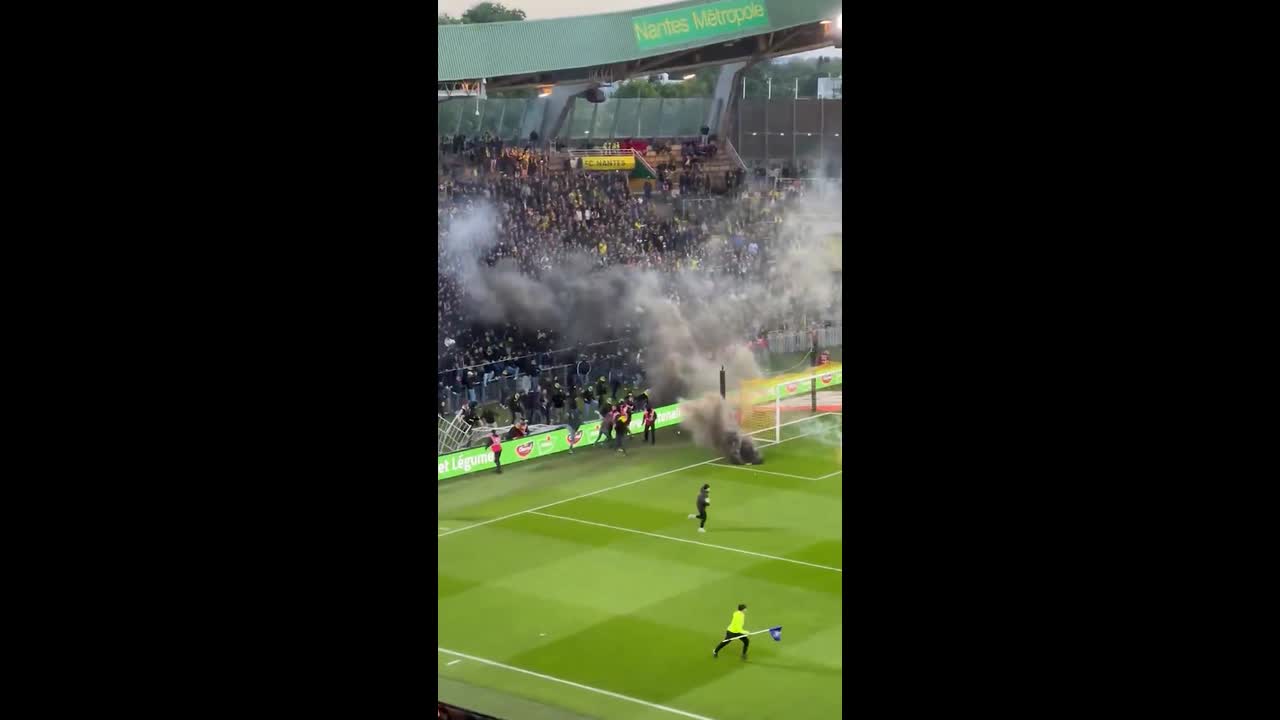 Furious Nantes supporters storm pitch following relegation from top flight