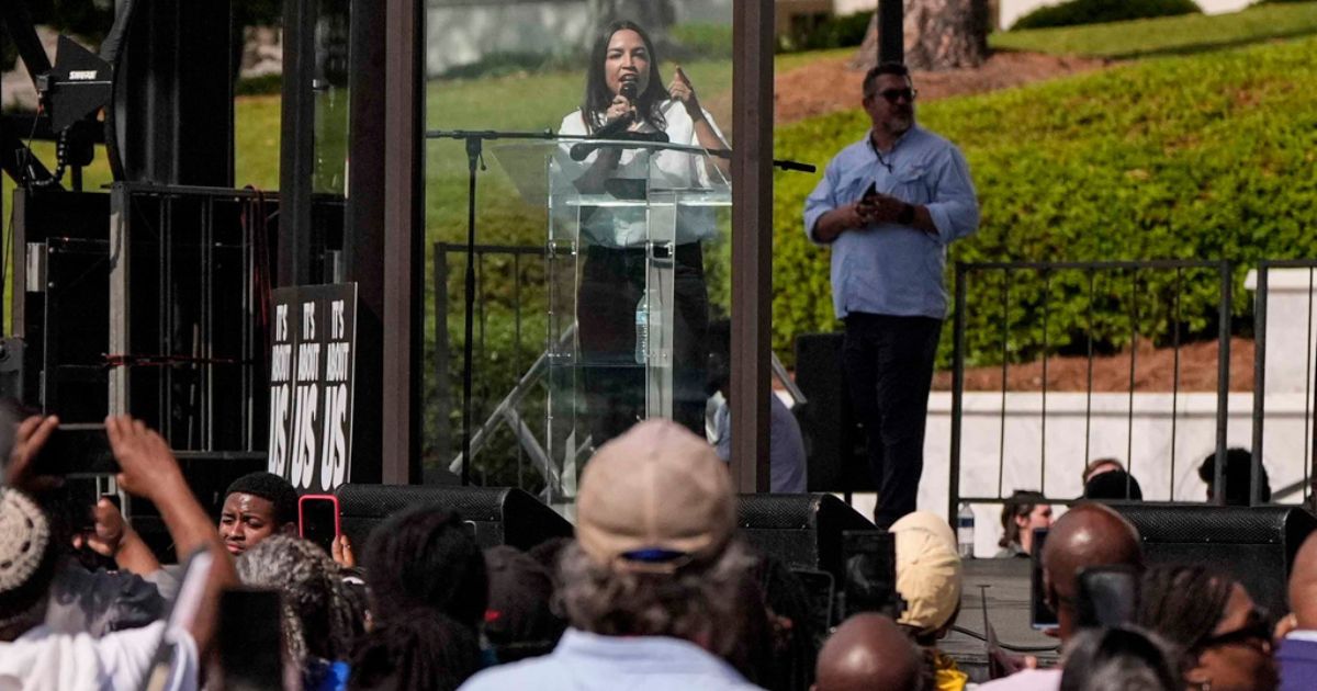 Video: AOC wheels out political prop we've never seen before - a bulletproof barrier, but there's a giant problem