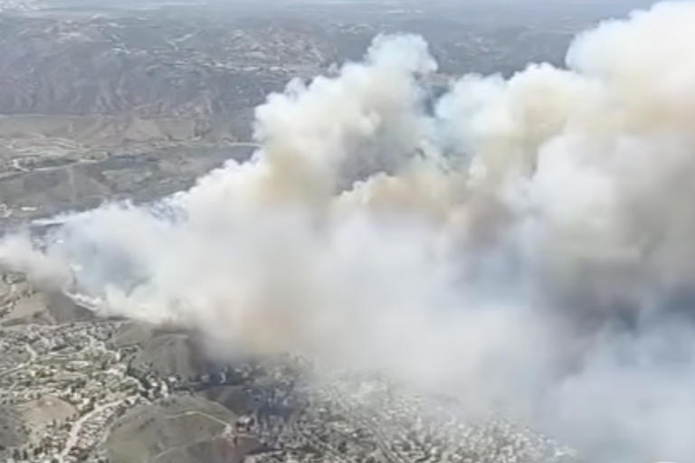 Evacuations ordered as fast-moving brush fire threatens Simi Valley homes