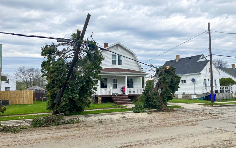 Two Rivers cleanup begins after storm downs trees and power lines