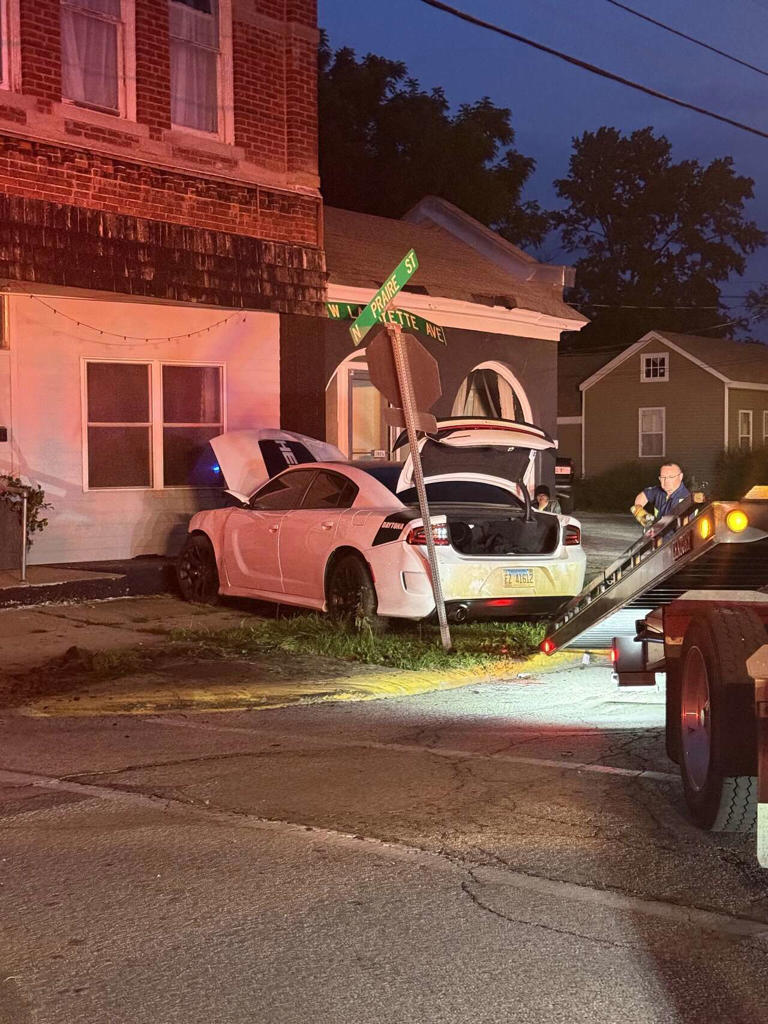 Woman shaken, but not injured, after car runs into house