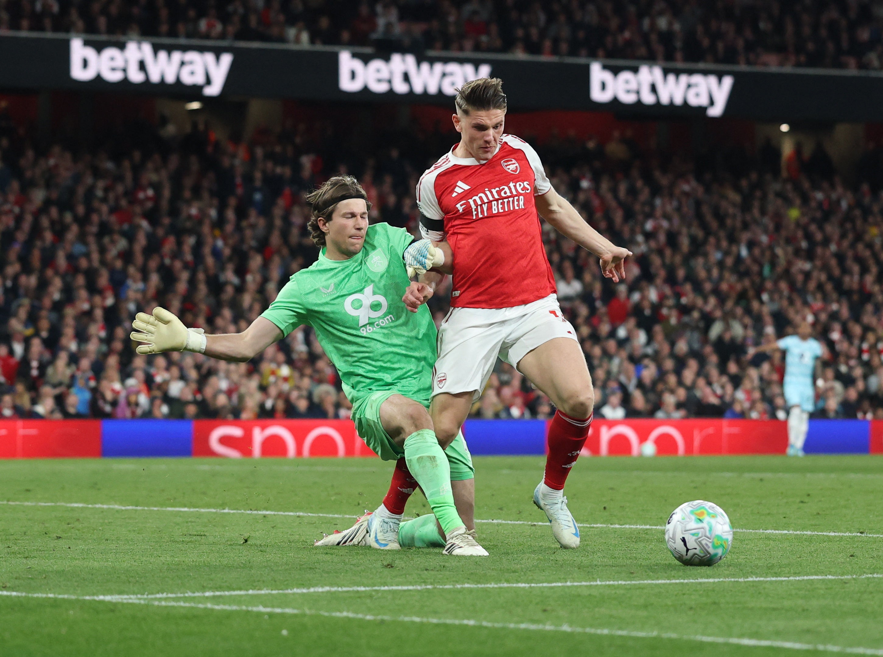 Nervy Arsenal scrape win over Burnley to move to brink of title