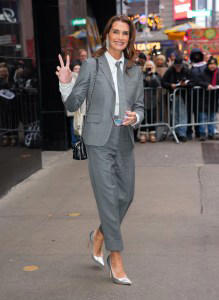 Brooke Shields keeps metallic pumps in her daytime menswear rotation