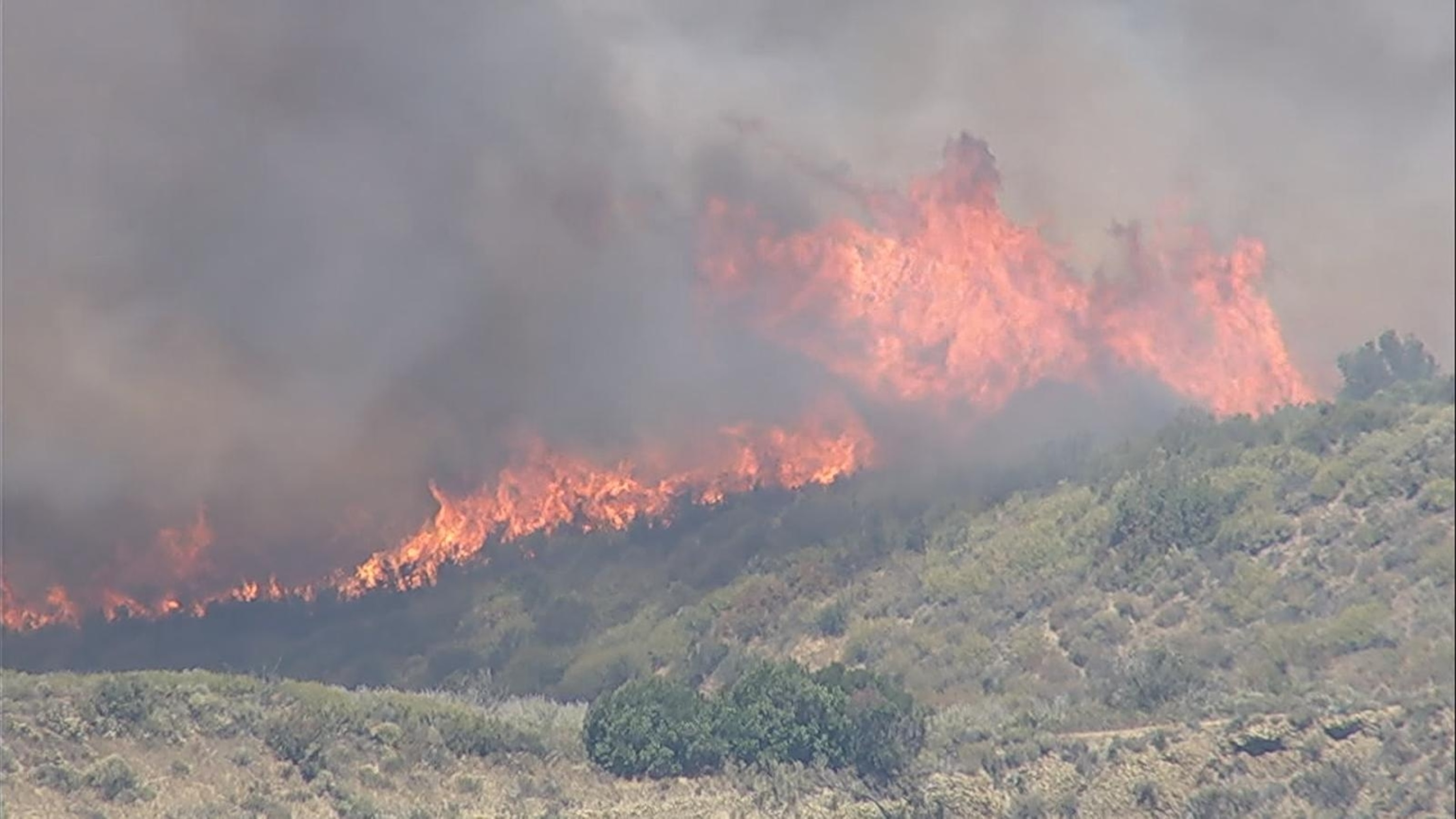 Brush fire burning in Southern California, evacuations underway