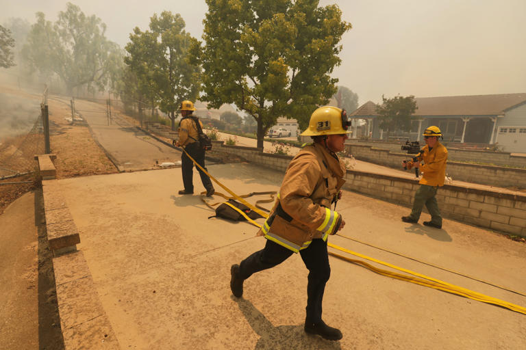 Thousands ordered to evacuate as Southern California wildfire threatens ...