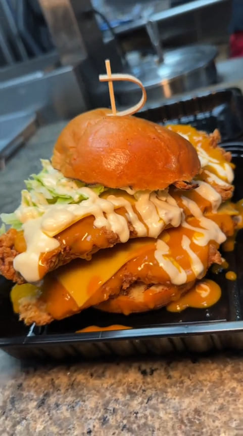 Indulge in the spicy fried chicken sandwich from Chicky's