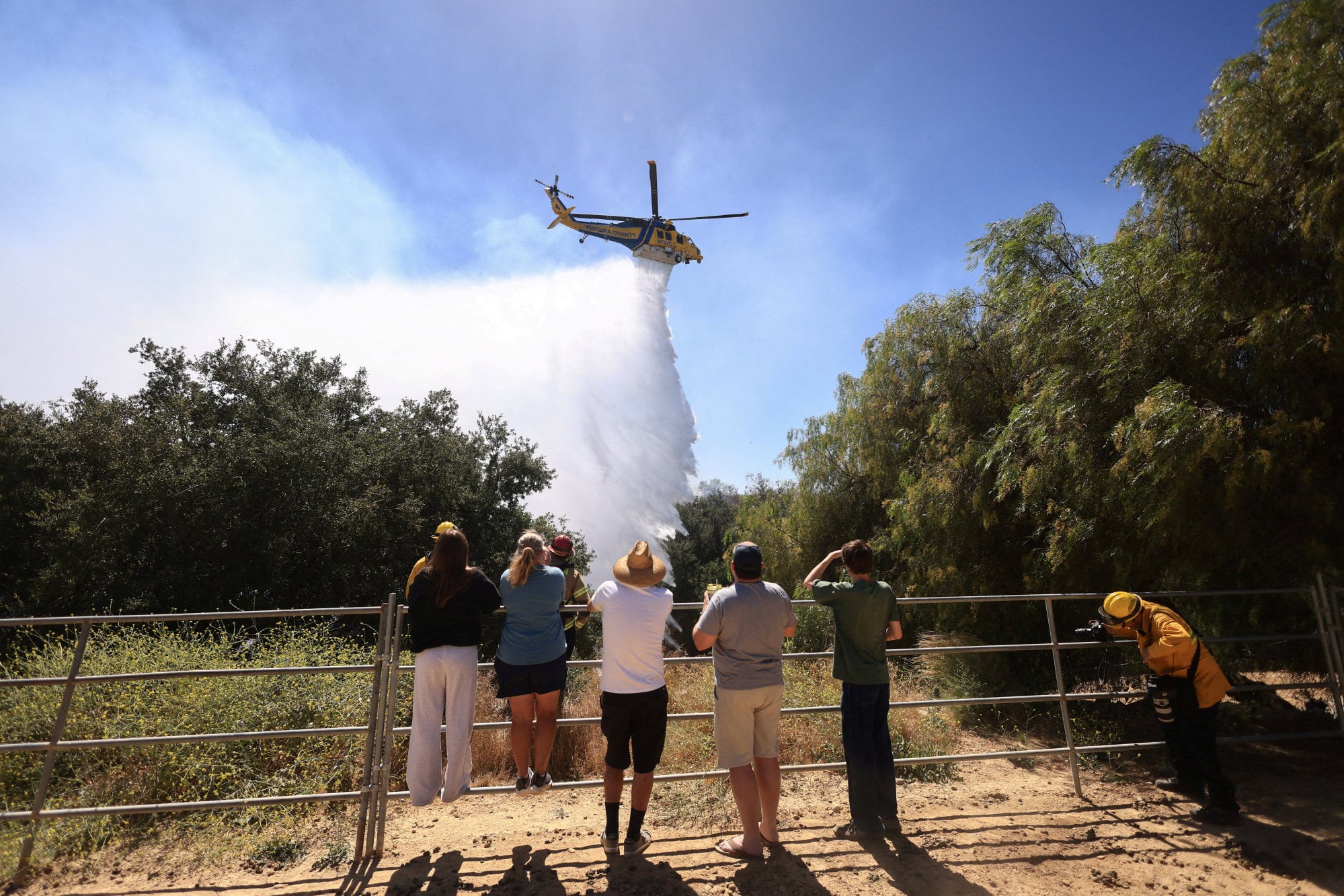 Thousands ordered to evacuate as Southern California wildfire threatens ...