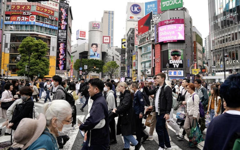 Japan says hosting record number of foreigners