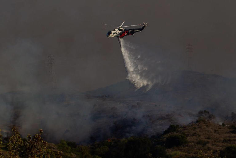 Brush fire near Los Angeles forces thousands to evacuate