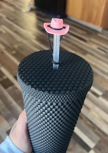 pink cowboy hat on a straw