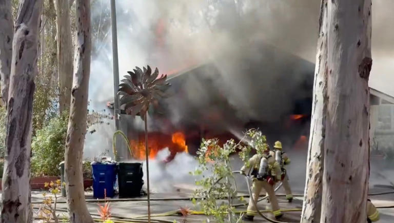 Fire erupts in garage of Orange County home